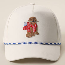 Load image into Gallery viewer, Dog Sitting Holding USA Flag White Rope Trucker Hat

