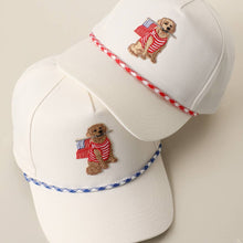 Load image into Gallery viewer, Dog Sitting Holding USA Flag White Rope Trucker Hat
